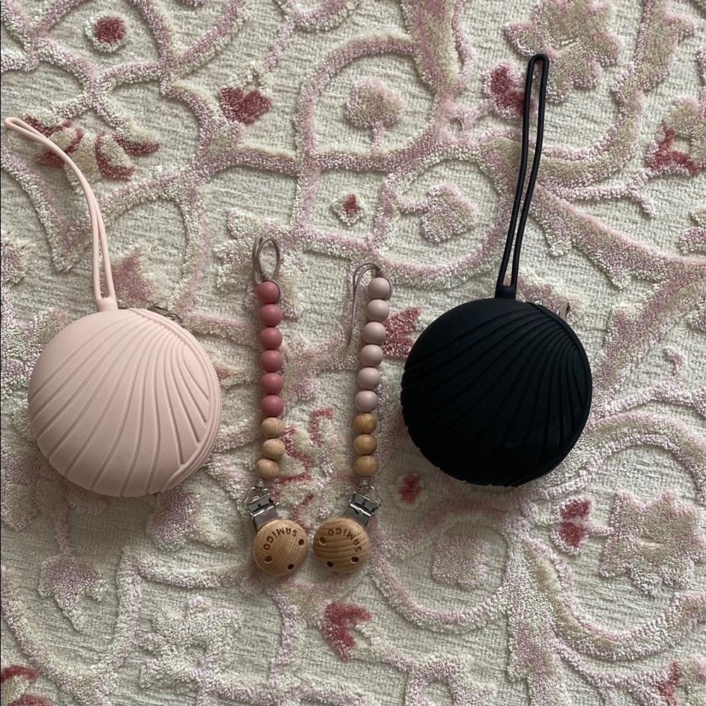 Pair of silicone pacifier cases and clips